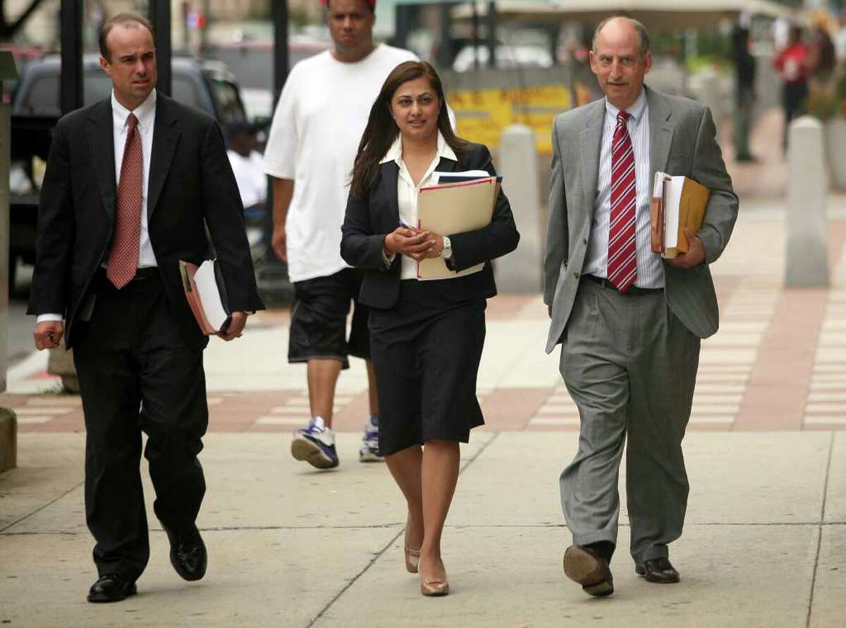 Prosecution lawyers, Stephen Reynolds, Krishna Patel and Richard Schecter arrive at New Haven Federal Court on Wednesday, August 18, 2010, where Douglas Perlitz pleaded guilty to one charge involving the sexual abuse of a minor boy. Perlitz will be sentenced on Dec. 21.