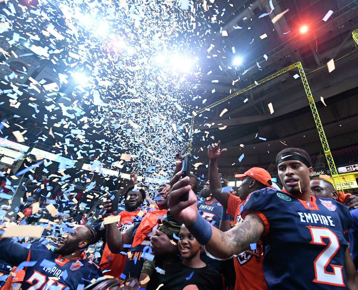 Albany Empire players celebrates after a 45-27 win against the Philadelphia Soul during the ArenaBowl XXXII football game at the Times Union Center, Sunday, Aug. 11, 2019, in Albany, N.Y. That was the last game they played before the AFL folded.