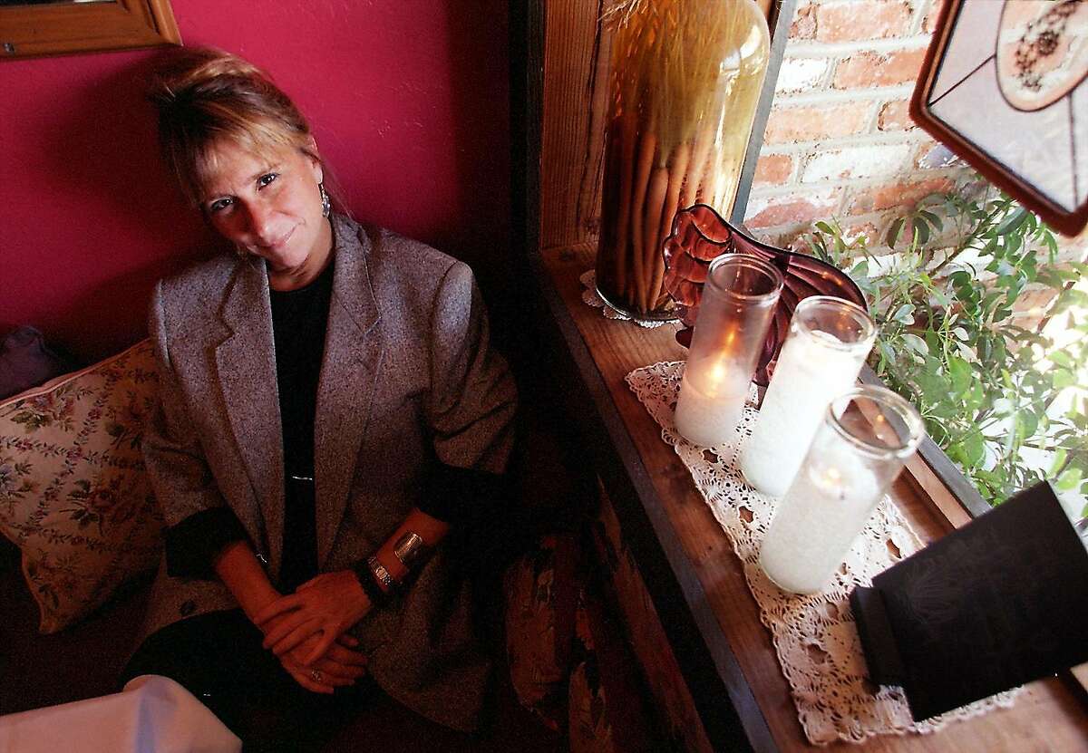 WORKMAN.02/C/30JUN98/PZ/CG --- Jesse Cool, owner of the Flea Street Cafe in Menlo Park, where she, over the last seventeen years, has created a well-known and cozy restaurant where she calls many of her customers by name. (CHRONICLE PHOTO BY CARLOS AVILA GONZALEZ)