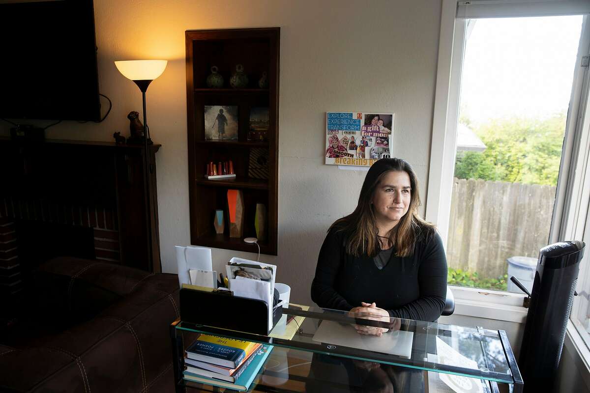A portrait of Tess Brigham at her home on Thursday, March 26, 2020, in El Cerrito, Calif.