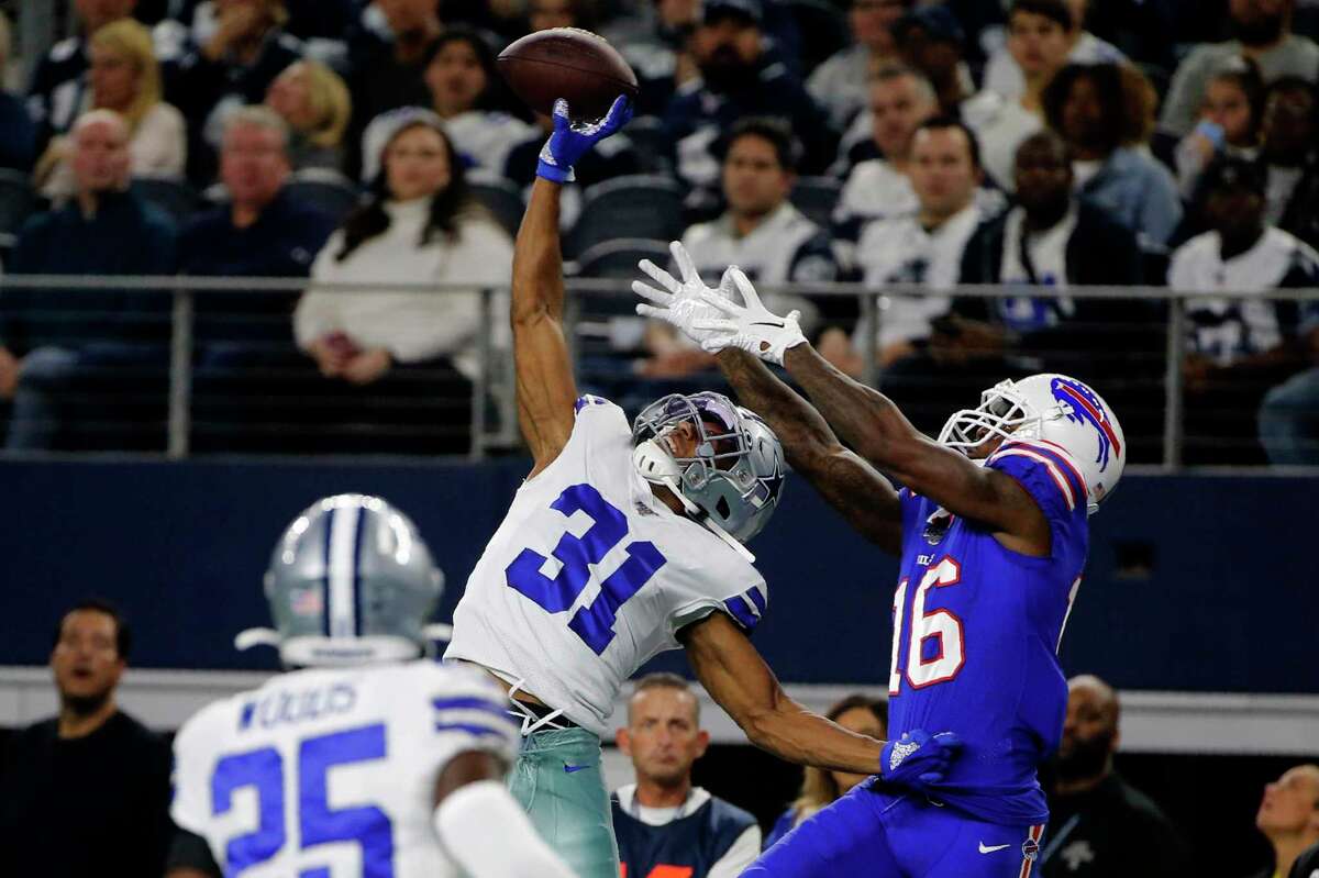 New Britain native and former UConn star Byron Jones breaks up a pass intended for Buffalo Bills wide receiver Robert Foster (16) in the first half of a game in Arlington, Texas, last season. Jones signed with the Miami Dolphins in March and became the highest paid defensive back in the NFL.
