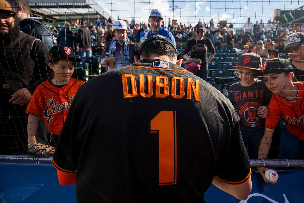 SCOTTSDALE, AZ - FEBRUARY 22: Mauricio Dubon #1 of the San Francisco Giants signs autographs before a game against the Los Angeles Dodgers on Saturday, February 22, 2020 at Scottsdale Stadium in Scottsdale, Arizona. (Photo by Adam Glanzman/MLB Photos via Getty Images)