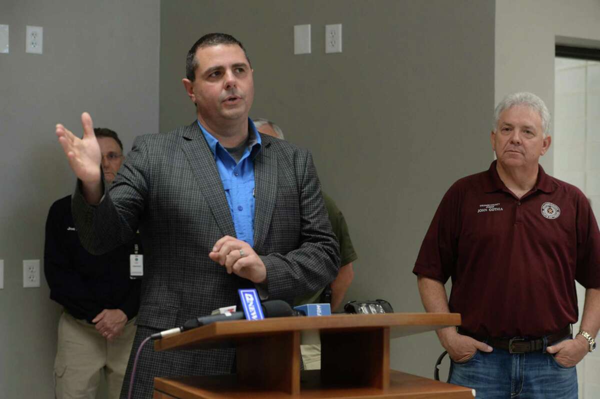 Hardin County Judge Wayne McDaniels fields questions as representatives from multiple Southeast Texas counties annnounce the opening of a drive-thru testing unit for COVID-19 at Jack Brooks Regional Airport Monday. Photo taken Monday, March 23, 2020 Kim Brent/The Enterprise