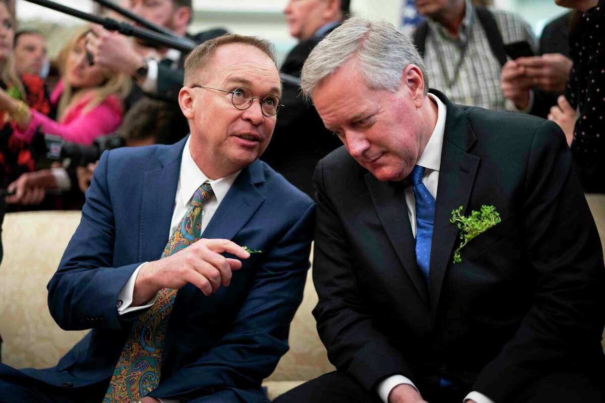 Outgoing White House chief of staff Mick Mulvaney talks with incoming White House chief of staff Rep. Mark Meadows, as President Donald Trump meets with Prime Minister Leo Varadkar of Ireland, at the White House in Washington, Thursday, March, 12, 2020. (Doug Mills/The New York Times)