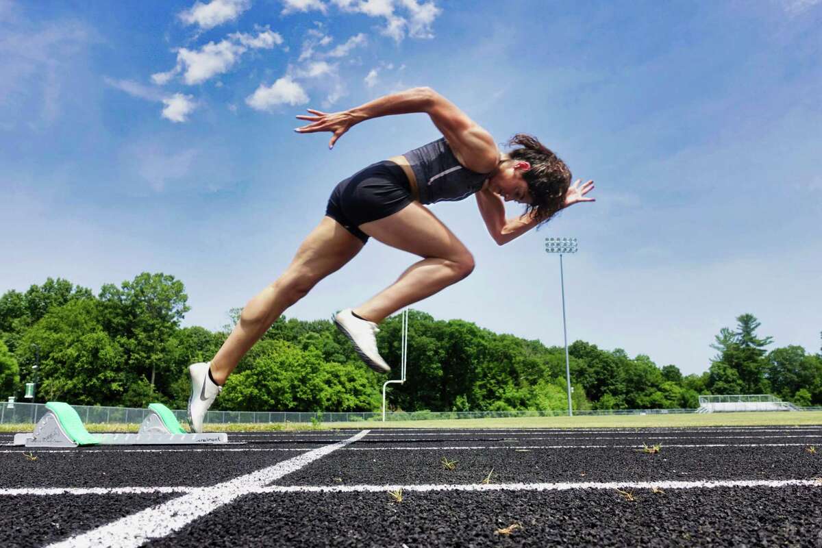 Sprinter, Mia D'Ambrosio, comes out of the blocks at Schalmont High School on Wednesday, July 10, 2019, in Schenectady, N.Y. D'Ambrosio is entering her senior year in high school. (Paul Buckowski/Times Union)