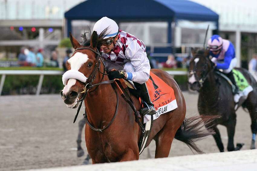 In this image provided by Gulfstream Park, Tiz the Law, riddren by Manuel Franco, wins the Florida Derby horse race at Gulfstream Park, Saturday, March 28, 2020, in Hallandale Beach, Fla.