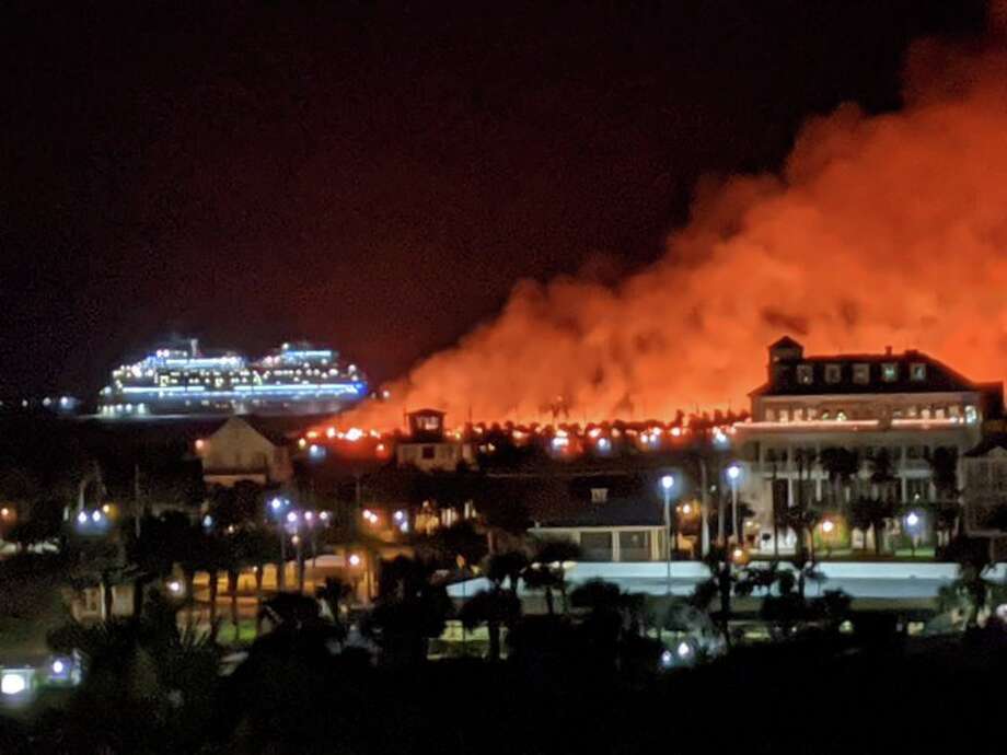 Firefighters battle large grass fire on Galveston Island's East Beach