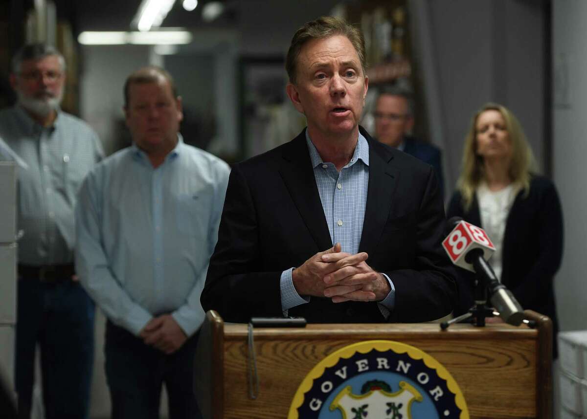 Governor Ned Lamont addresses the media at medical equipment manufacturer Bio-Med Devices in Guilford, Conn. on Sunday, March 29, 2020. The company has signed a contract to produce ventilators for the state at an initial quantity of ten per week for ten weeks.