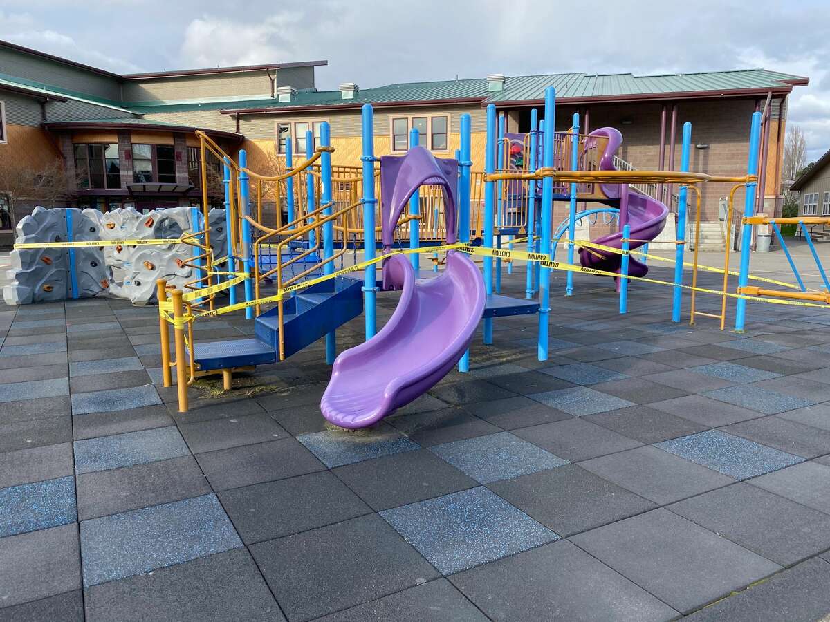 A playground in White Center, Wash. is closed off with caution tape on March 29, 2020. Gov. Inslee's "Stay Home, Stay Healthy" order includes the closure of all King County parks and playgrounds.