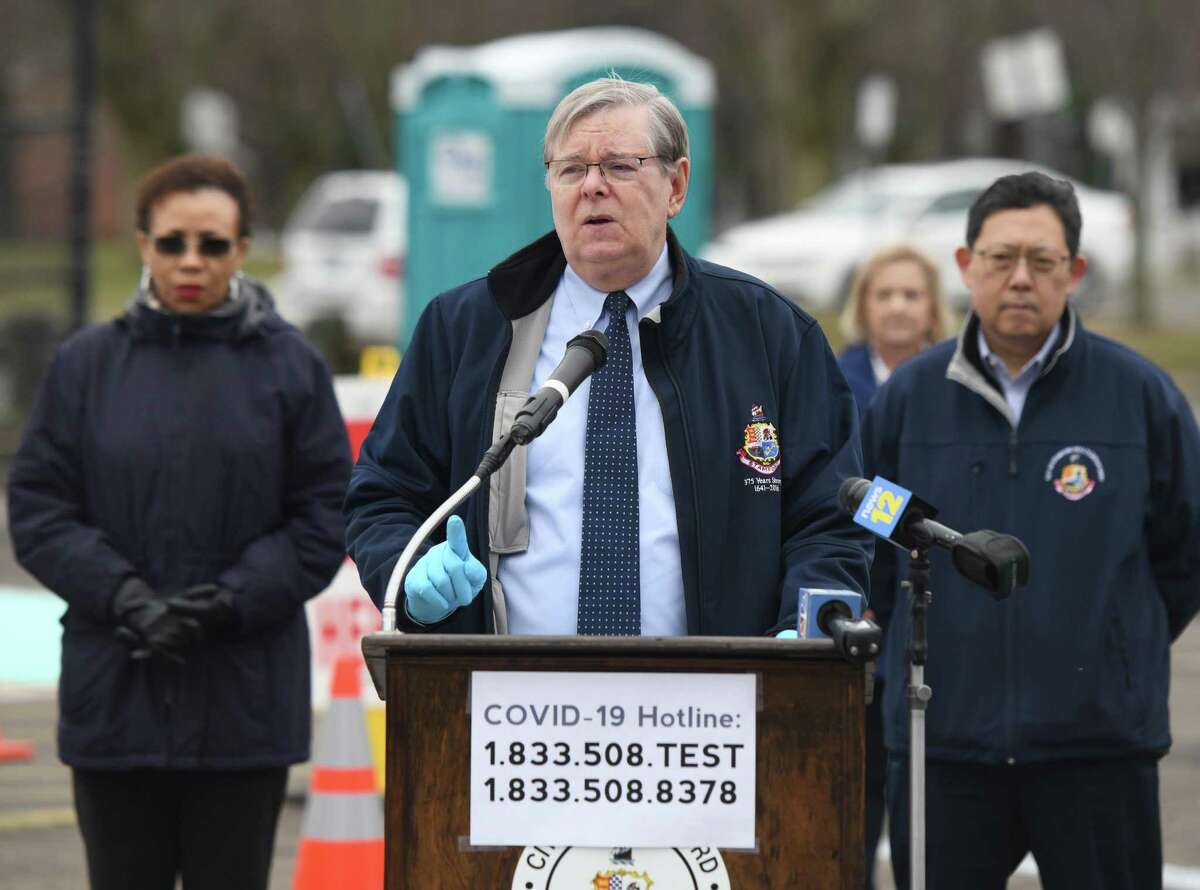 Stamford Mayor David Martin speaks about the coronavirus situation at the new testing center at Westhill High School in Stamford, Conn. Monday, March 30, 2020.
