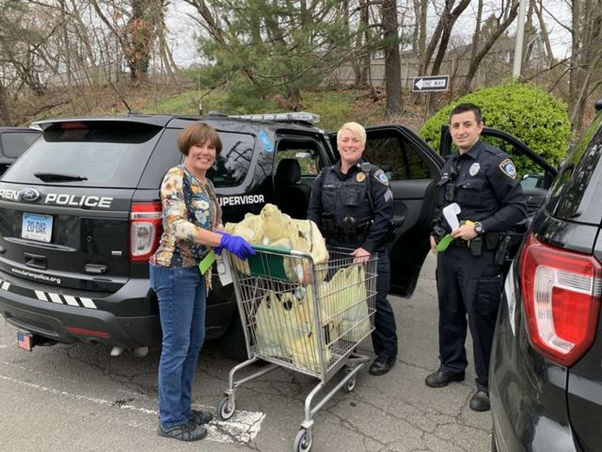 Darien Police help Palmer’s deliver groceries for seniors, those in need