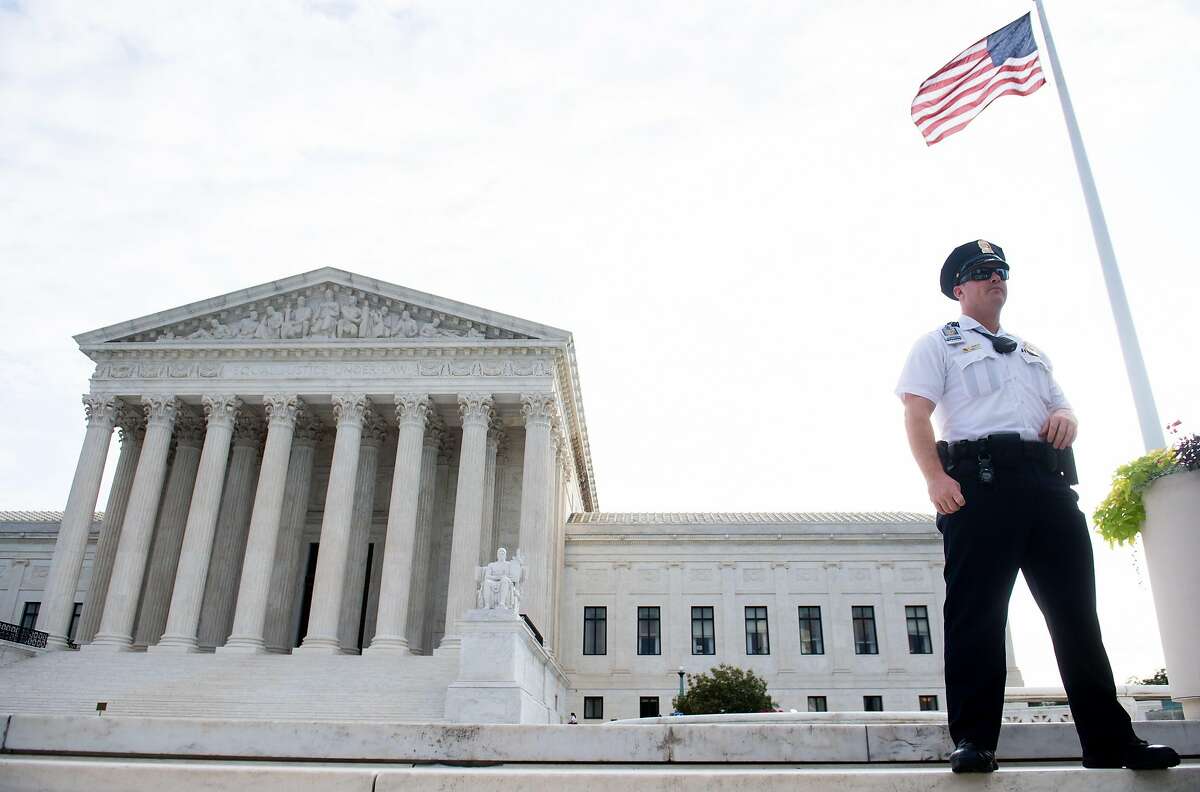 (FILES) In this file photo taken on October 07, 2019 The US Supreme Court is seen on the first day of a new term in Washington, DC. - The US Supreme Court announced its first halt to hearings in over a century due to the coronavirus pandemic, putting off a key case on whether President Donald Trump can continue to hide his tax returns. The highest US court said that is would postpone oral arguments scheduled between March 23 and April 1 "in keeping with public health precautions recommended in response to COVID-19." (Photo by SAUL LOEB / AFP) (Photo by SAUL LOEB/AFP via Getty Images)