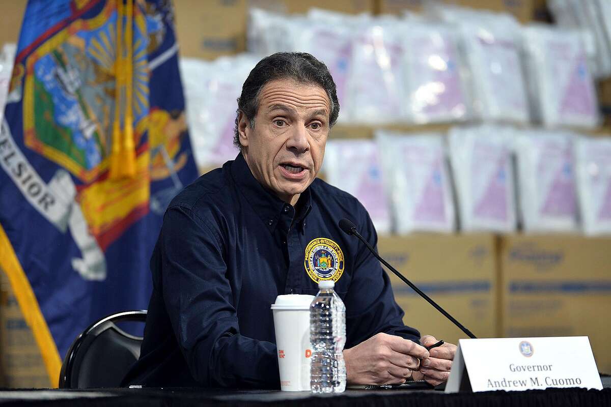 Against a backdrop of medical supplies, New York Gov. Andrew Cuomo talks during a news conference regarding the coronavirus outbreak at the Jacob Javits Center in New York on March 24, 2020. (Anthony Behar/Sipa USA/TNS)