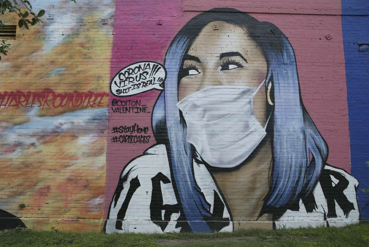 A mural of Cardi B sports a mask in response to the coronavirus threat, Monday, March 30, 2020. The mask was placed by the mural's artist Colton Valentine. The mural is located at the 800 block of San Pedro Avenue.