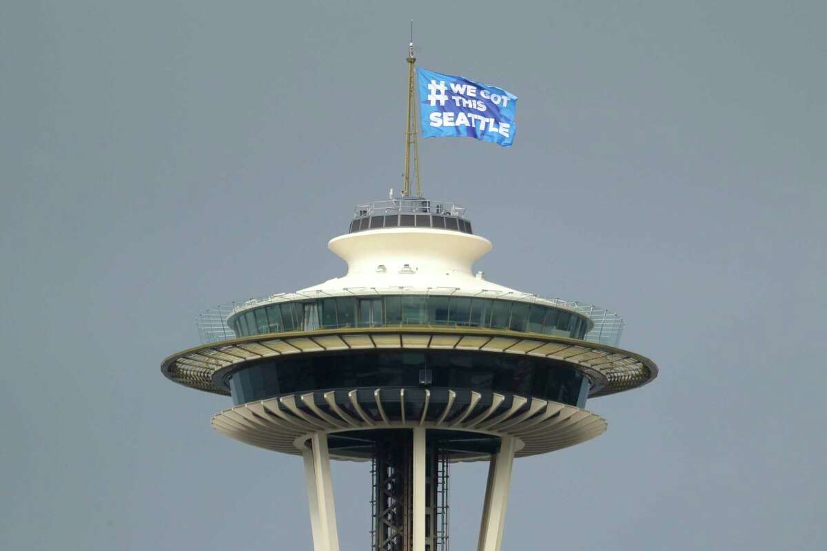 A flag that reads “#We Got This Seattle” flies on the Space Needle. Keep clicking for all the good news coming out of Seattle in the midst of the novel coronavirus.