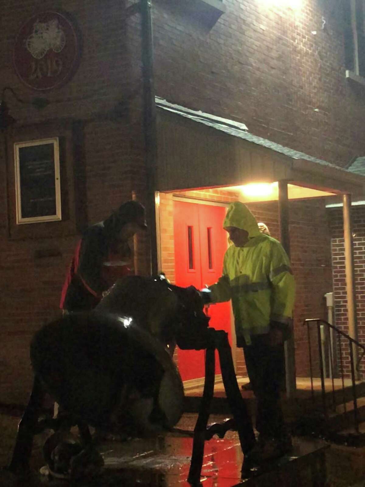 Members of Water Witch Hose Co. #2 in New Milford are ringing the historic bell in front of the firehouse every night at 8 p.m. in a show of unity, according to Fire Chief Rich Squires. The bell ringing will continue each night until the directive to stay at home is lifted. Above, Rich Squires last Saturday night.