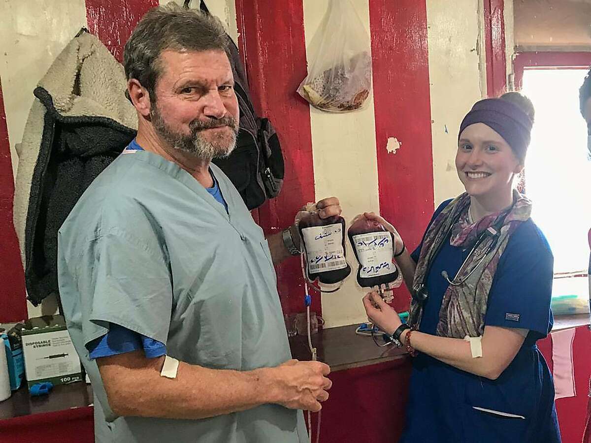 Dr. Steve Whiteley, a Bay Area resident and retired ER doctor, pictured with colleague Katie Biniki after donating blood while volunteering overseas. The two are stranded in Iraq and are not sure when they’ll return home to help treat COVID-19 patients.