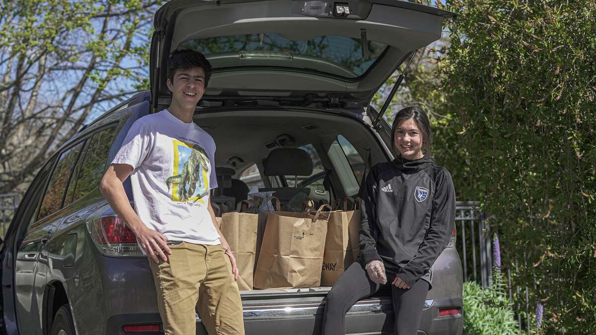 Los Altos seniors Greg Corn and Kayleen Gowers are delivering groceries to neighbors in need, for free, during the Bay Area shelter in place order.