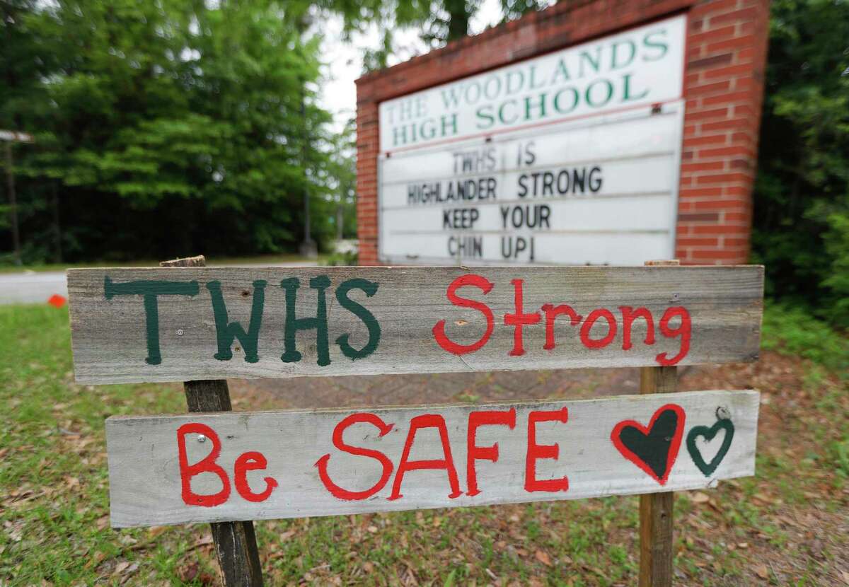 Signs of encouragement are seen at The Woodlands High School, Tuesday, March 31, 2020, in The Woodlands.