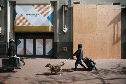 During the coronavirus shutdown, SF’s Union Square takes on new look — plywood storefronts ...