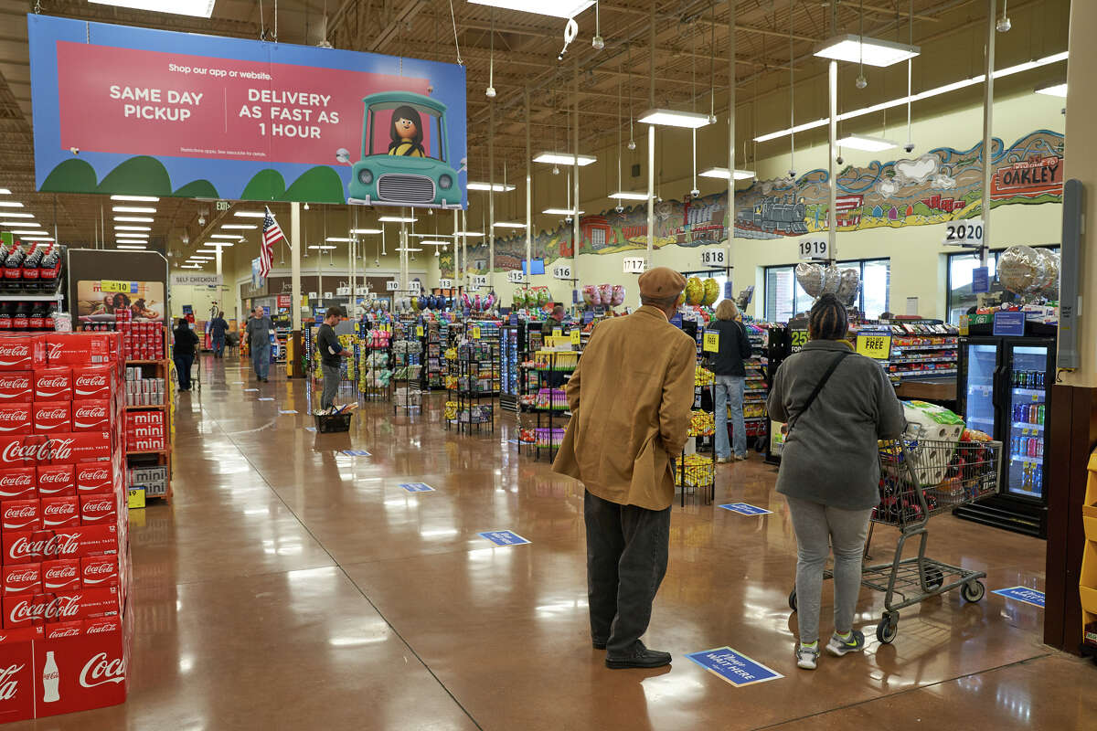 Kroger photos show measures the grocer has taken to protect employees from coronavirus.