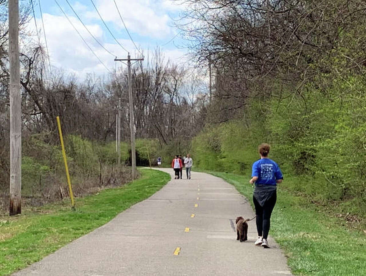 The Madison County Transit trails in Edwardsville continue to be an escape for residents cooped up from the stay-at-home order during the coronavirus outbreak. Cyclists, joggers and walkers took advantage of the sunny conditions Tuesday afternoon.