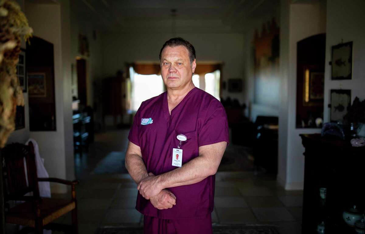 Dr. Henry Nikicicz, a veteran anesthesiologist at a hospital in El Paso, Texas, at his home, March 30, 2020. Many hospitals bar doctors and other staff members from wearing protective masks in public areas. Some have been disciplined for pushing back, including Nikicicz, who was threatened with suspension.