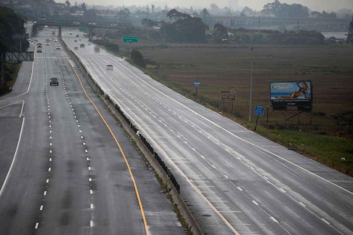 Traffic is light on Interstate 580 in Richmond. Bay Area traffic has decreased as much as 70% since the shutdown with greenhouse gas emissions falling here and globally, clearing the air everywhere..