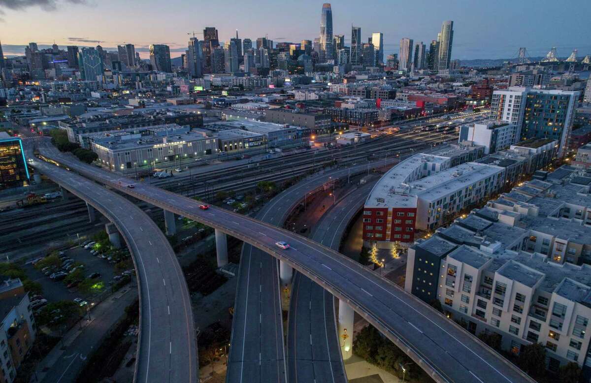 The San Francisco skyline visible from above Highway 280 as it splits to Sixth Street and King Streets with crisp visibility thanks to the lack of cars in San Francisco, Calif., on March 30.