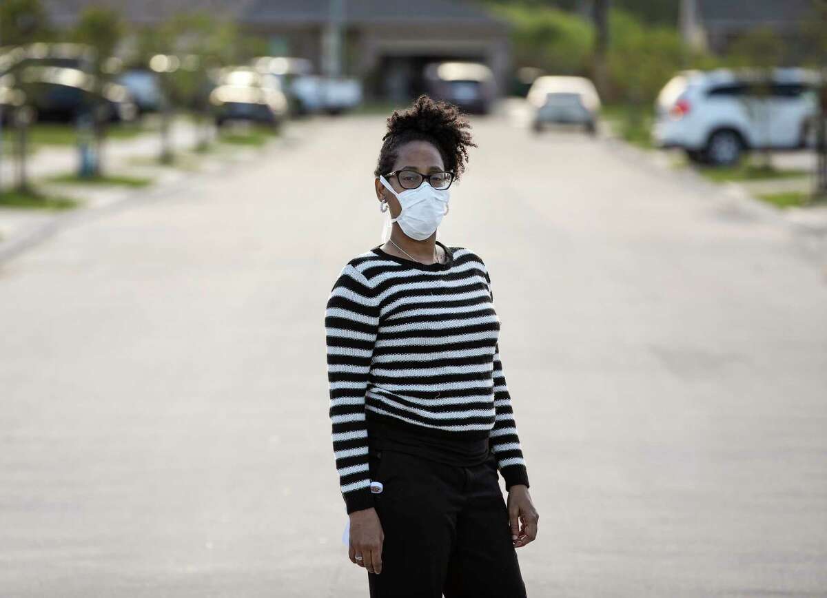 Tanya Mitchell, a nurse, poses for a portrait near her home Wednesday, April 1, 2020, in Houston. Her son, Markaylan Mitchell, is in the Harris County Jail, and she is advocating for his release, due to concerns about the spread of COVID-19.