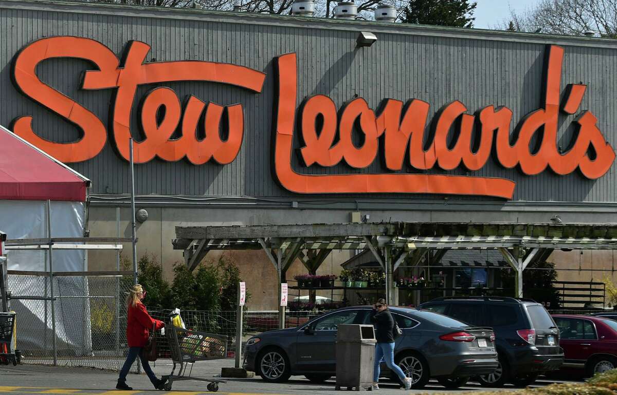 Shoppers partonize Stew Leonard's Wednesday, March 18, 2020, in Norwalk, Conn. A part-time employee has tested positive for the coronavirus.