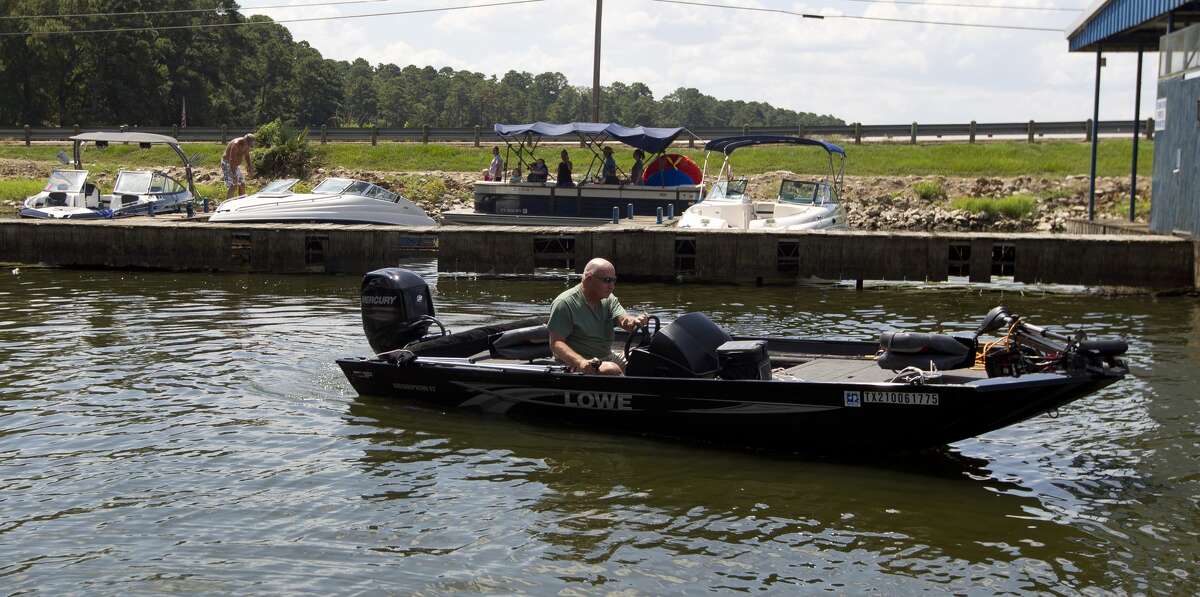 Boaters enjoy Stow-A-Way Marina on Labor Day, Monday, Sept. 2, 2019, in Conroe.