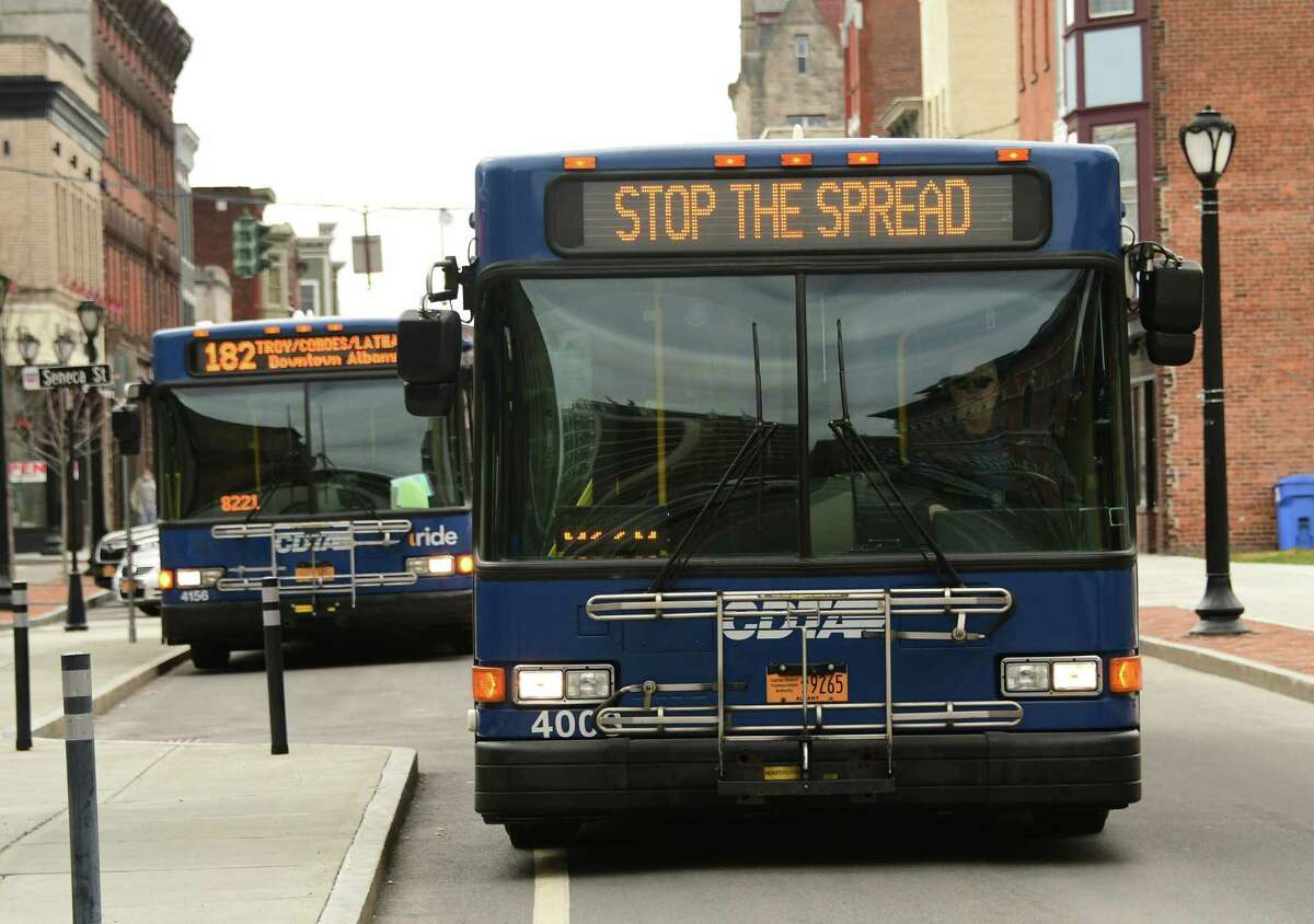 A CDTA bus on Remsen St. displays a "stop the spread" message as a result of the COVID-19 pandemic on Thursday April 2, 2020 in Cohoes, N.Y.. (Lori Van Buren/Times Union)