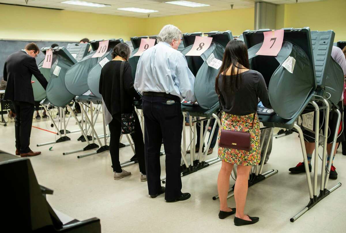 Houston voters cast their ballots at the Metropolitan Multi-Service Center on West Gray. The Texas secretary of state has yet to offer clear guidance on the expansion of vote-by-mail during the coronavirus outbreak.
