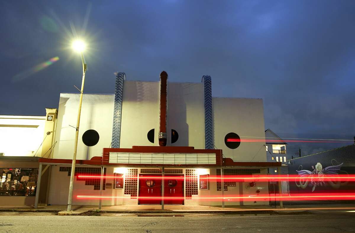 The Heights Theater had its lights off and marquee blank in Houston on Friday, March 20, 2020. Analysts expect films to spend less time in theaters before they become available in living rooms after the pandemic subsides.