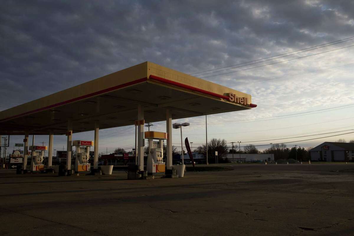Fuel pumps stand at a Royal Dutch Shell Plc gas station in Princeton, Illinois, U.S., on Wednesday, April 1, 2020. Royal Dutch Shell, one of the world’s largest oil companies, said its crude production peaked in 2019, yet another sign of society’s accelerating shift away from fossil fuels amid growing concerns about climate change.