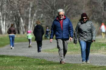 Visitors take adavantage of the nice weather Wednesday, April 1, 2020, at Sherwood Island State Park in Westport, Conn.