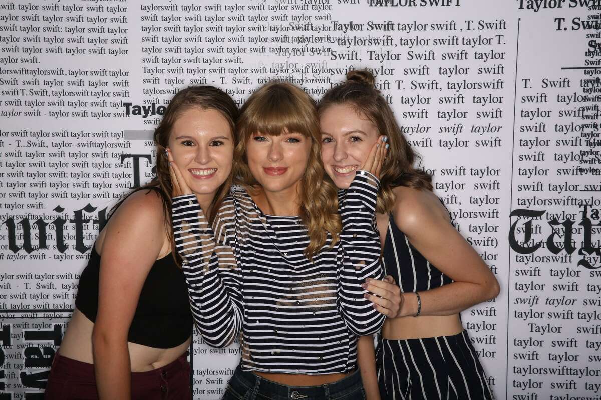 Jess Buslewicz (right) pictured with her sister, Jordan, and pop star Taylor Swift in 2018.