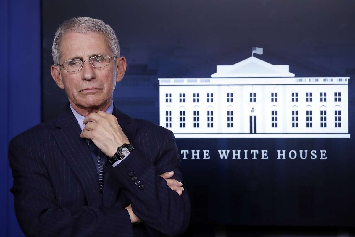 Dr. Anthony Fauci, director of the National Institute of Allergy and Infectious Diseases, listens during a briefing about the coronavirus in the James Brady Press Briefing Room of the White House, Wednesday, April 1, 2020, in Washington. (AP Photo/Alex Brandon)