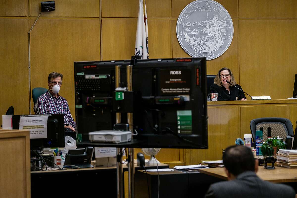Judge Loretta Giorgi presides over court cases while other officers of the court contribute remotely in San Francisco, Calif. on Friday April 3, 2020.