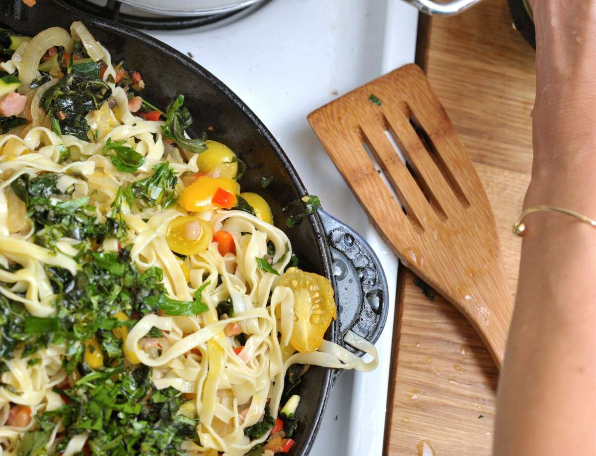 The Heirloom Chef is a Bay Area company that offers locals a menu created by personal chefs. The staff prepare dishes for individuals that have dietary restrictions. Pictured is a gluten-free pasta with heirloom tomatoes and kale.