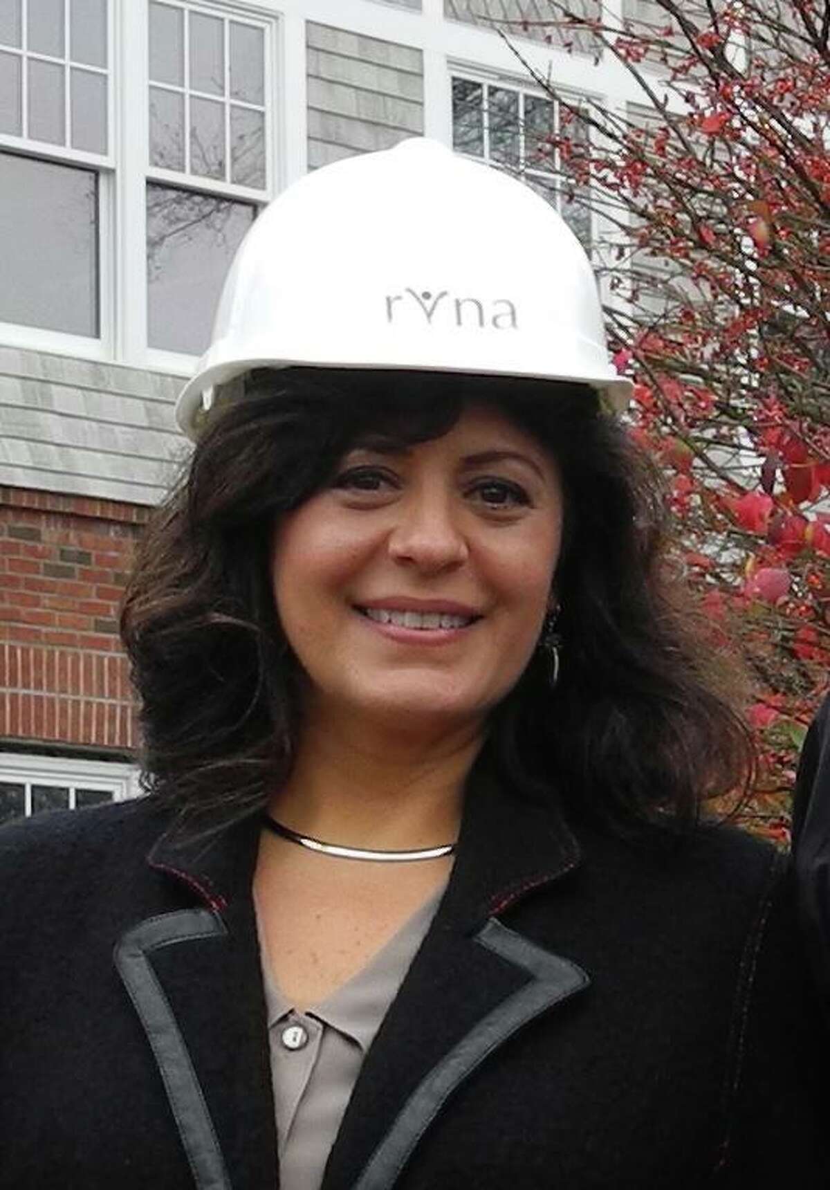 Theresa Santoro leads the RVNA, which serves 28 Connecticut towns. She donned a hard has in 2015 when giving a tour of group's headquarters, then still under-construction in Ridgefield.