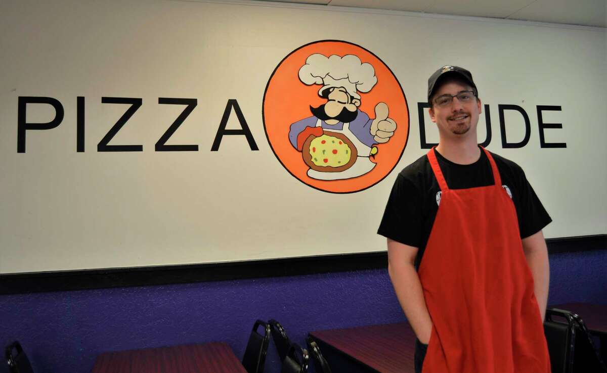 George Prokop poses for a photo at his Midland-based Pizza Dude restaurant, located at 4328 N. Saginaw Road. He is now the sole owner of the Pizza Dude franchise. (Ashley Schafer/Ashley.Schafer@hearstnp.com)
