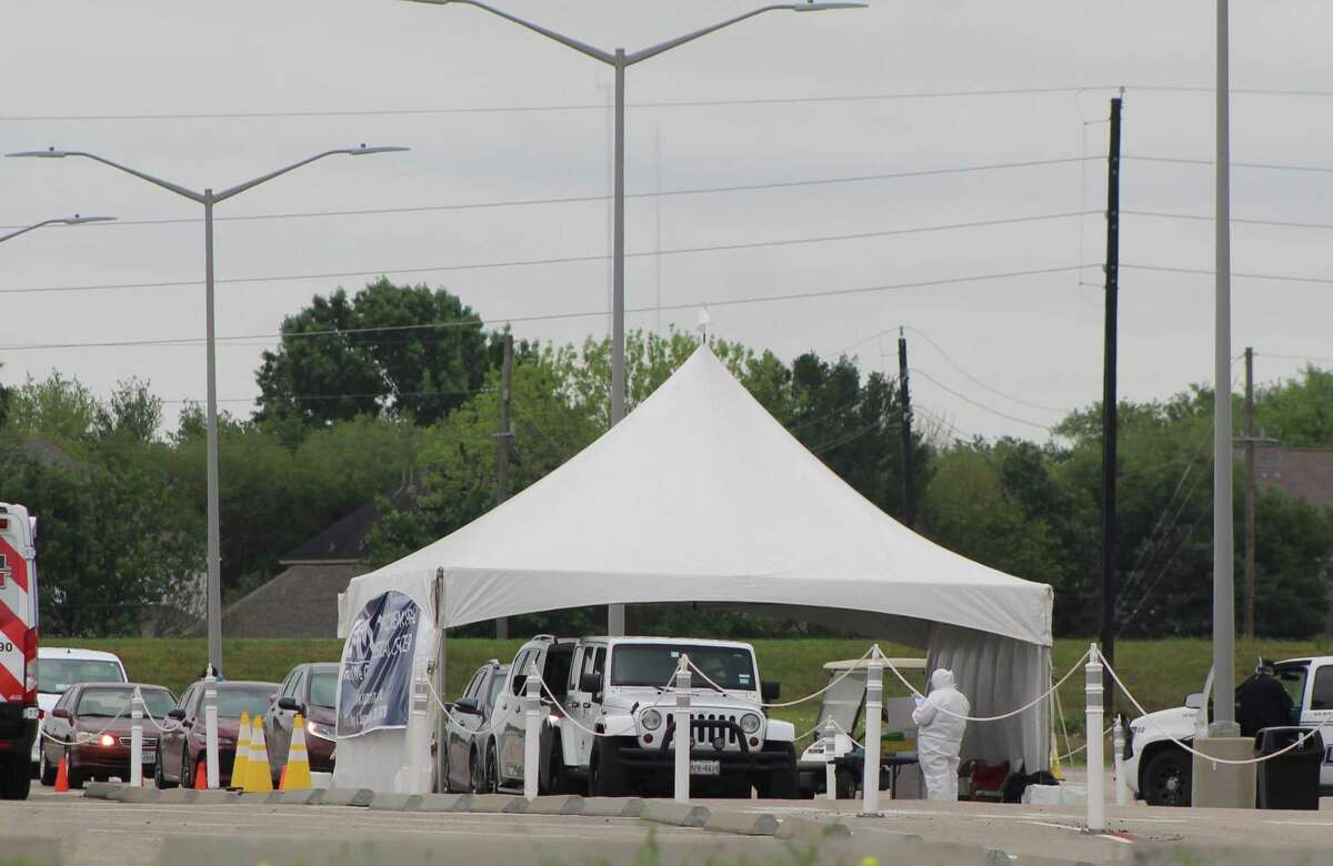 Hundreds of cars lined up at a free COVID-19 testing site operated by United Memorial Medical Center outside Sugar Land's Smart Financial Center on Friday, April 3.