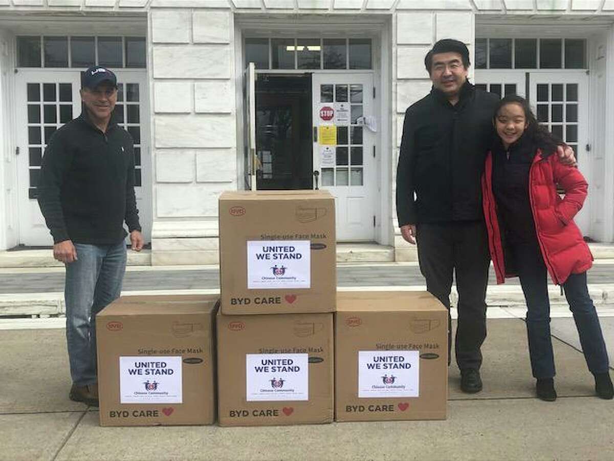 First Selectman Fred Camillo welcomed a donation on Thursday of desperately needed masks to help first responders and medical staff at Greenwich Hospital. Town resident Andrew Mao and his daughter Emily brought the masks through the efforts of Chinese Community, an organization representing several towns in Fairfield County, including Greenwich. -