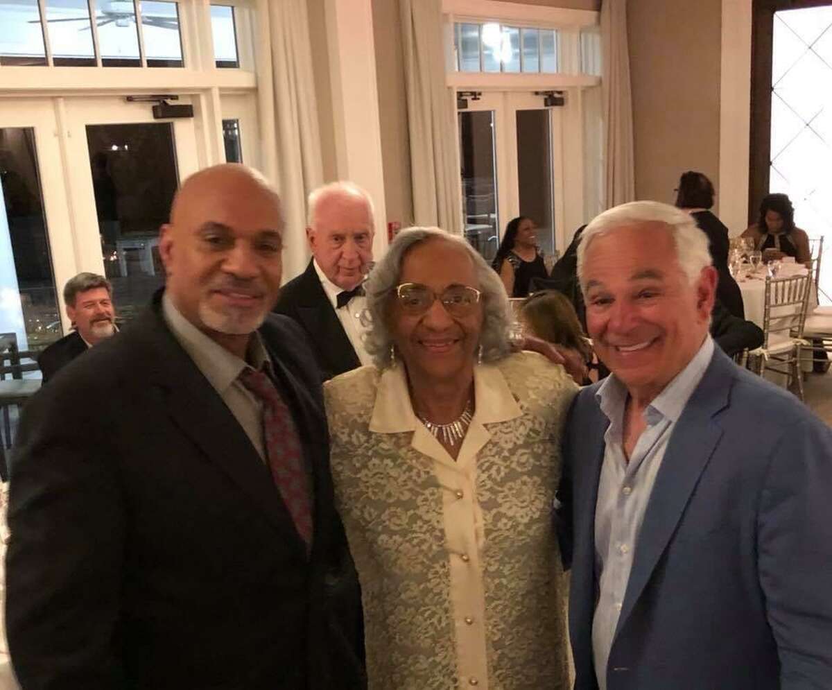 Mary Roman with her son, Craig, left, and former Major League Baseball manager Bobby Valentine. Roman, a longtime Norwalk resident who overcame childhood polio to become a world-class senior Olympian, died Monday from the coronavirus.