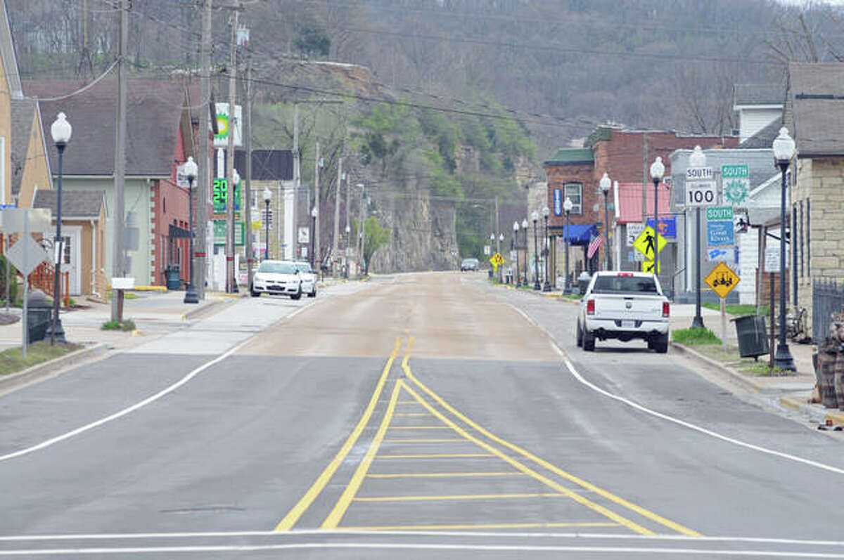 Grafton’s East Main Street — normally filled with visitors and vehicles because of the Mississippi River tourism sites — is empty on Saturday due to the current COVID-19 restrictions.