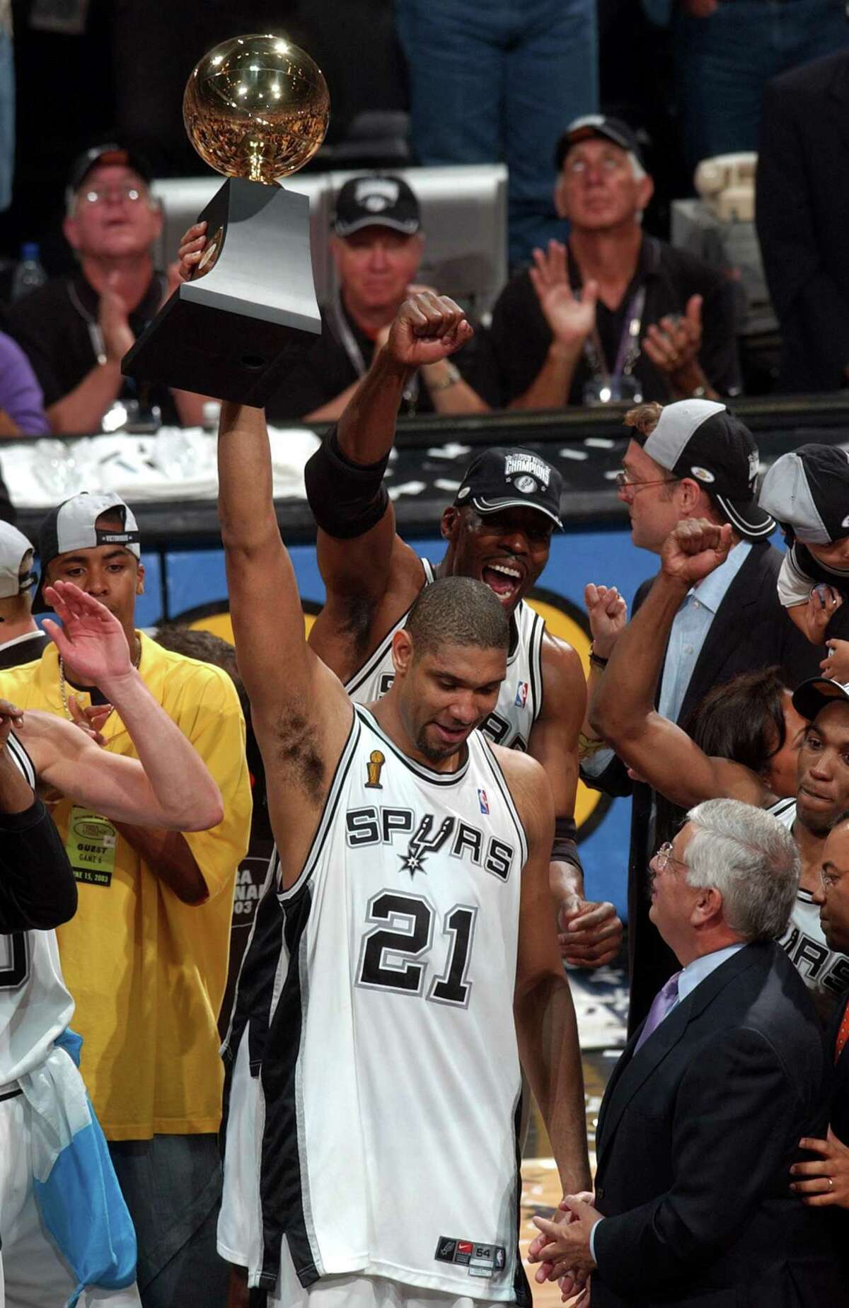 Tim Duncan accepts the most valuable player trophy during Game 6 NBA Finals at what then was known as the SBC Center in 2003.