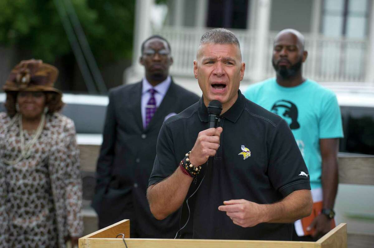 FILE  - Westhill High School principal Michael Rinaldi speaks during the Stop the Violence rally at Jackie Robinson Park in Stamford, Conn. on Sunday, Sept. 23, 2018.
