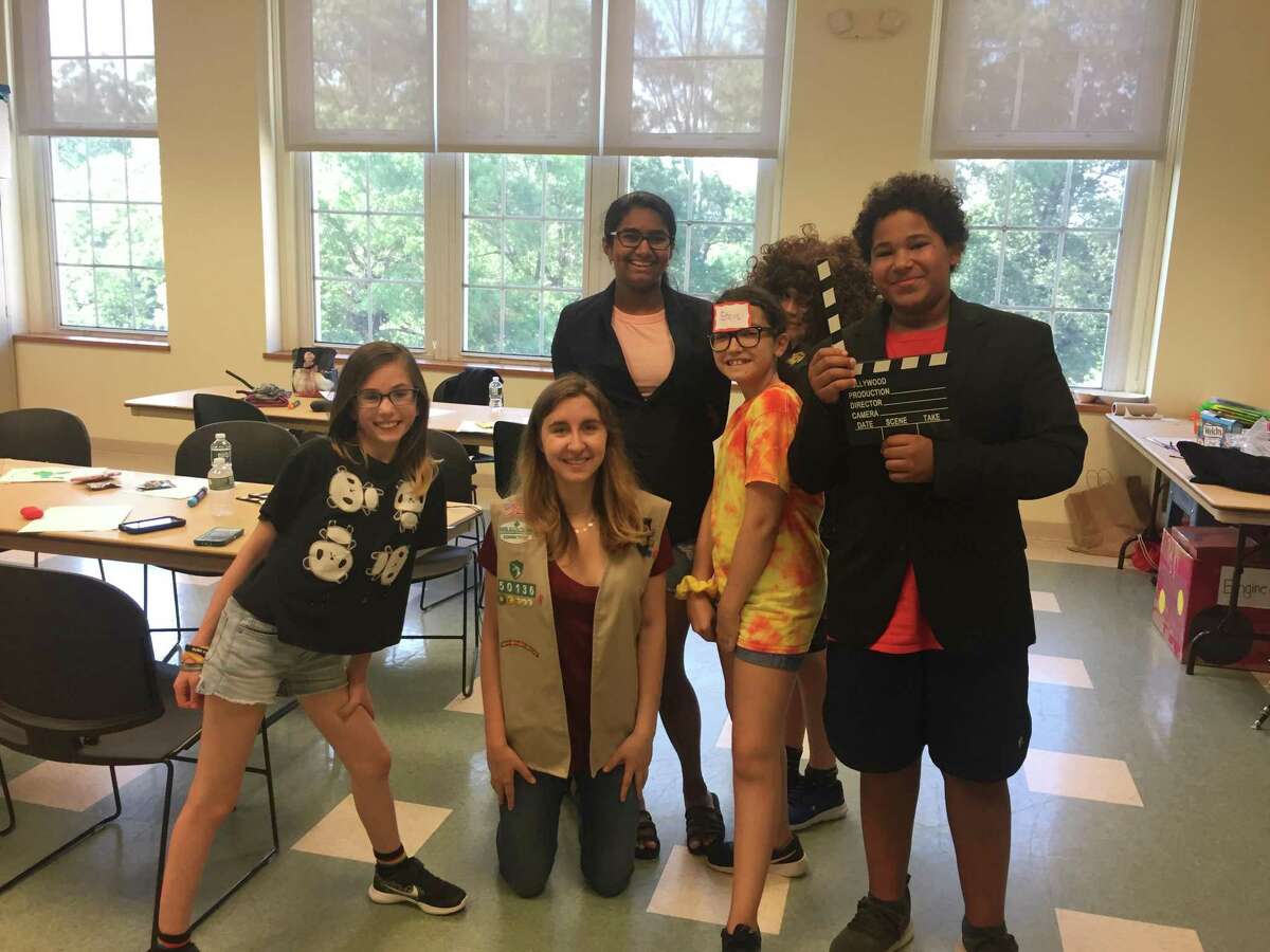 Local Girl Scout Elizabeth Casolo teaches a lesson in the significance of digital media education to Greenwich middle school students. Casolo, a Greenwich High School junior, is working toward achieving her Gold Award, a prestigious honor for Girl Scouts.